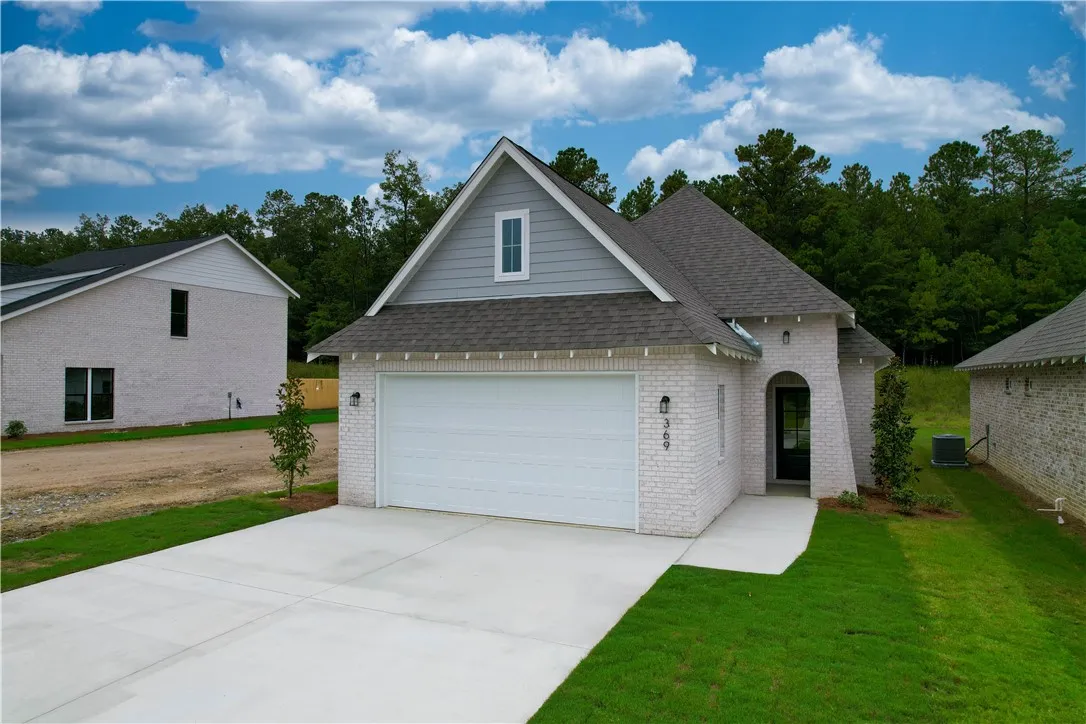 Not the subject property but is a similar variation of the plan shown here. All plans, pricing, and specifications are subject to change without notice.