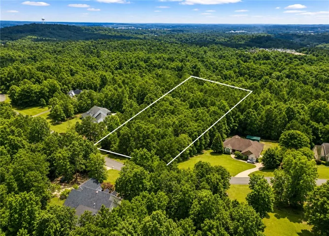 Located within an established neighborhood, this 3-acre property offers a peaceful, rural feel just minutes from town.