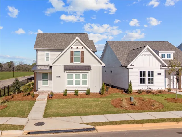 This charming residence showcases appealing curb appeal and a well-maintained exterior.