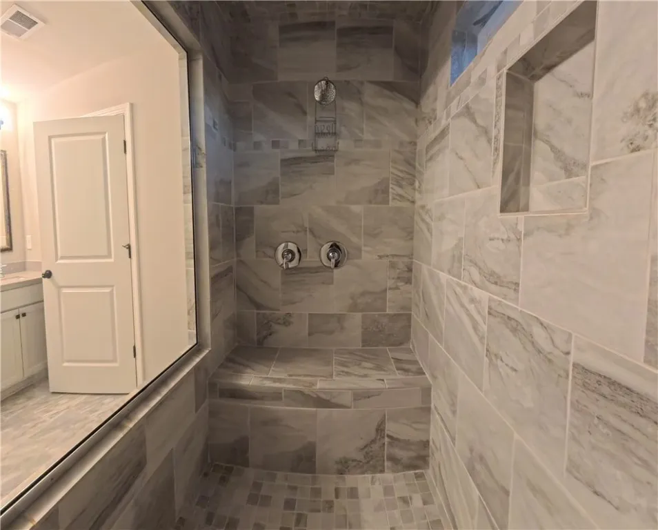 Master Bath - Tiled shower with seat