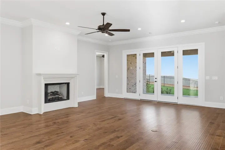 A four-panel door system provides wonderful natural light in the great room.