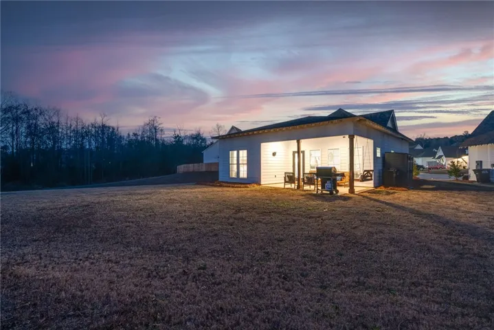 Home sits on a premium lot with large, level yard