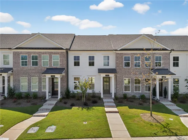 Photo not of subject property. Photo is of finished building in community for reference.