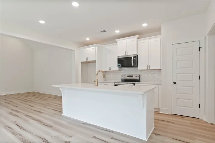 Not the subject property but is a similar variation of the plan shown here. All plans, pricing, and specifications are subject to change without notice.