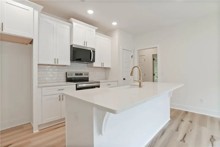 Not the subject property but is a similar variation of the plan shown here. All plans, pricing, and specifications are subject to change without notice.