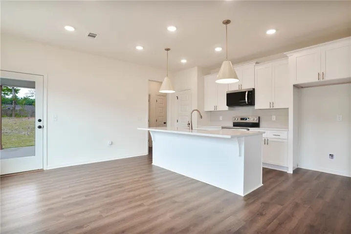 The Hampton B by Holland Homes LLC. All plans, pricing, and specifications are subject to change without notice.