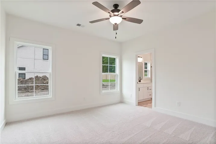 Not the subject property but is a similar variation of the plan shown here. All plans, pricing, and specifications are subject to change without notice.