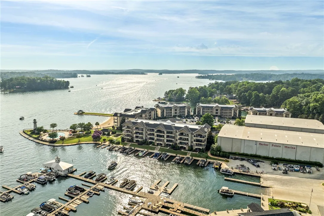 Overlooking a tranquil lake, this property boasts a marina with direct access to water recreation.