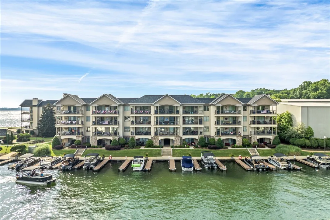 Lakeside living offers private boat slips and a scenic view of the expansive waters.