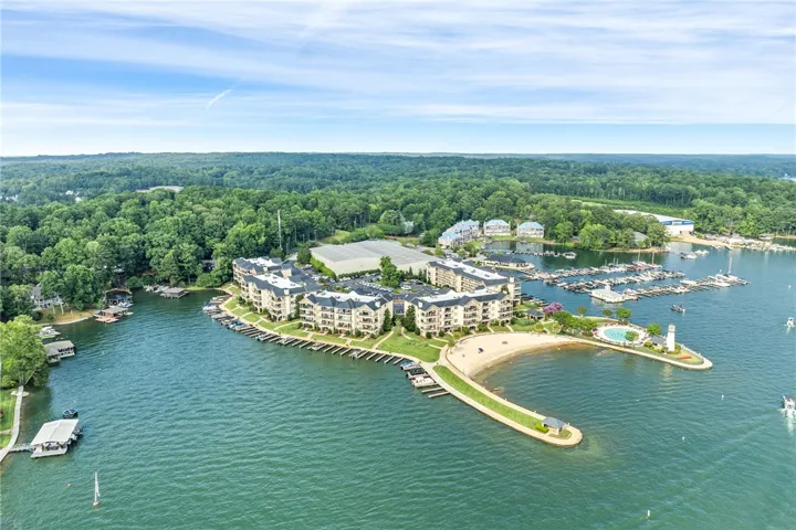 Discover a stunning waterfront community featuring a private marina and inviting sandy beach access.