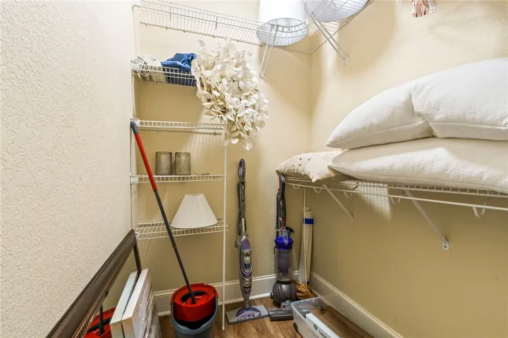 Well-organized closet space featuring sturdy wire shelving for versatile storage solutions.