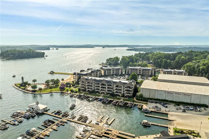 Overlooking a tranquil lake, this property boasts a marina with direct access to water recreation.