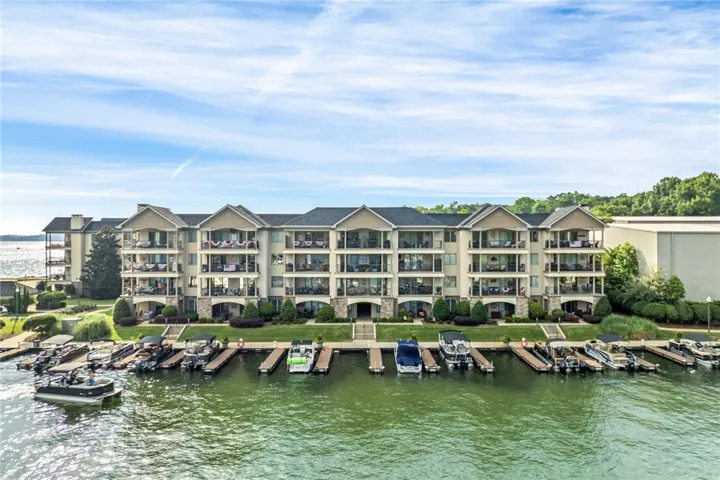 Lakeside living offers private boat slips and a scenic view of the expansive waters.