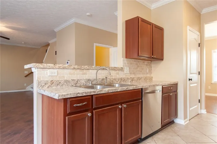 Kitchen bar overlooks Great Room