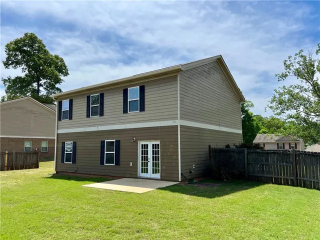 This charming home offers a private yard and easy outdoor access.