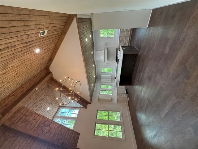 This airy space combines rustic charm with modern amenities, featuring warm wood accents and abundant natural light.