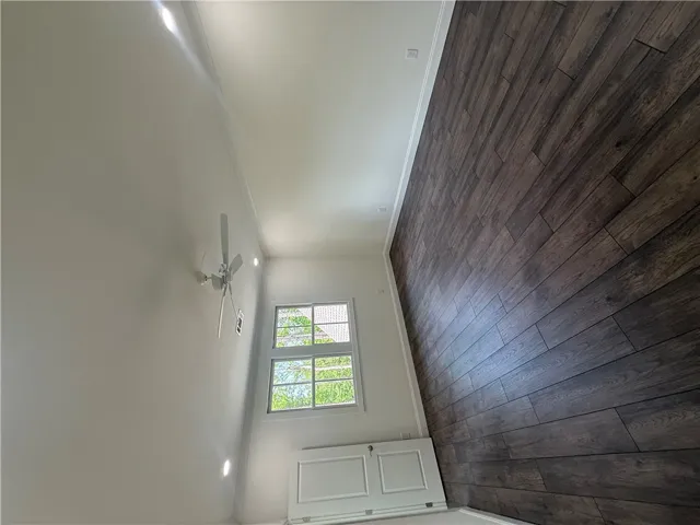This living space features durable flooring and abundant natural light.