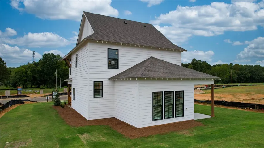 Example of a completed Trent Plan - Backyard & exterior of Home - All plans, pricing, and selections/specifications are subject to change without notice.