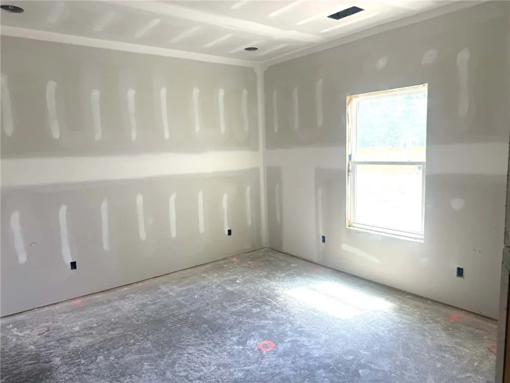Sun-filled room awaiting finishing touches, ready for your custom design.