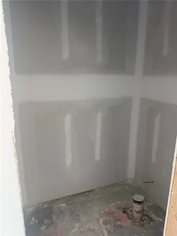 A compact interior space awaits a custom build-out to maximize its utility.