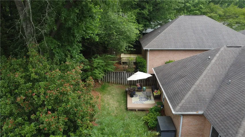 This property features a charming backyard retreat, perfect for relaxation and outdoor gatherings.