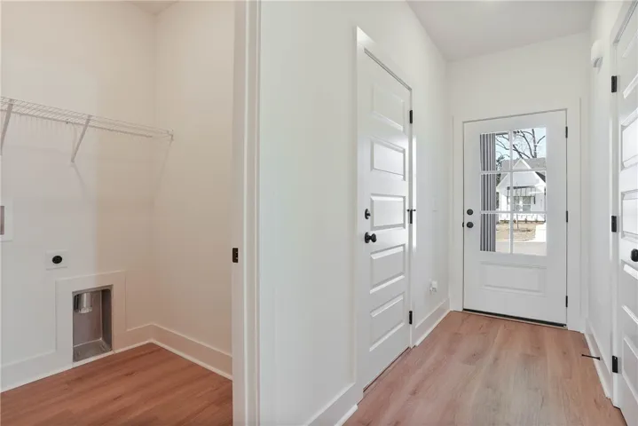 Entry Foyer, Garage Access, Storage Closet, Laundry Room