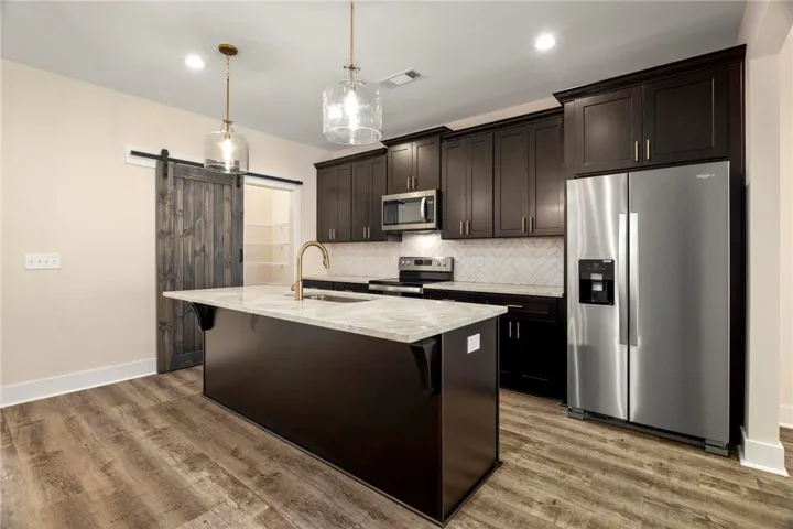 Not the subject property, but is a similar plan. All plans, pricing, and specifications are subject to change without notice.