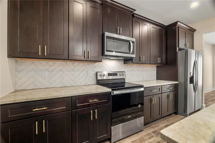 Not the subject property, but is a similar plan. All plans, pricing, and specifications are subject to change without notice.