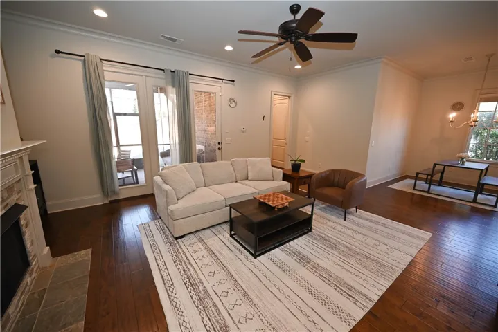 Behind the living room is the back porch.