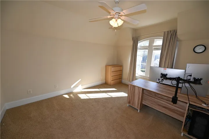 Bedroom 4 with another set of large, beautiful windows.