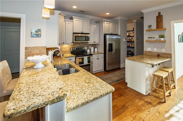 open to the living area, the kitchen provides easy entertaining and accessibility