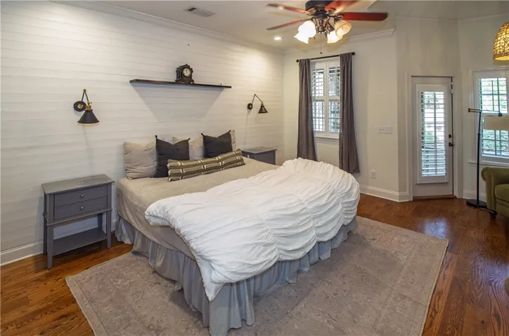accent shiplap provides texture and interest to this primary bedroom