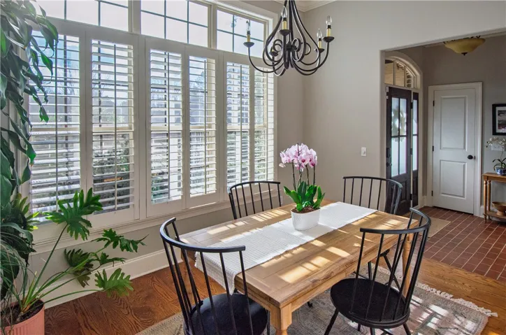 transom windows flood the dining room with sunlight!