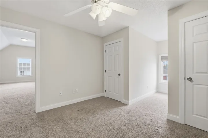 Bedroom 3 is similar in layout to bedroom 2, but it also opens to a large bonus room.