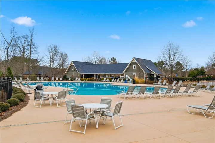 Home is located on the same street as the community pool.