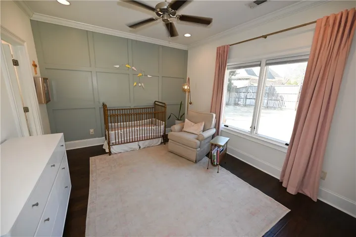 Bedroom 2 features an interesting accent wall, recessed lighting & full en suite bathroom.