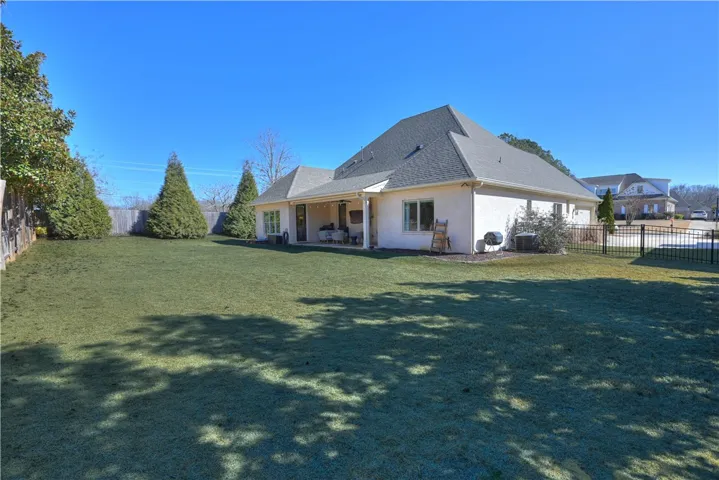 Large, fenced, private back yard.