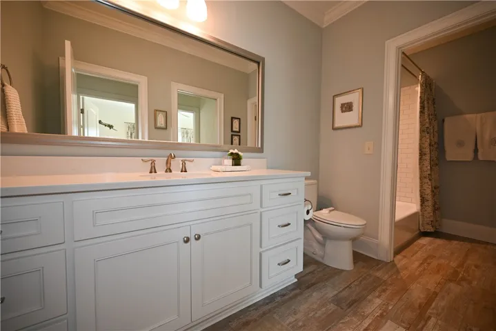 Bathroom 3 connects to bedroom 3 and the foyer.  Separate shower area.