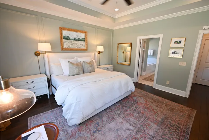 Primary bedroom suite with sound proof windows & beautiful trim detail.