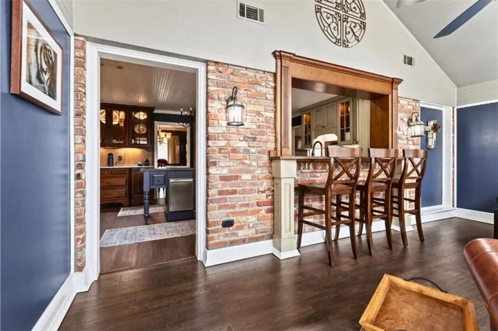 sunroom with wall of windows facing the lake