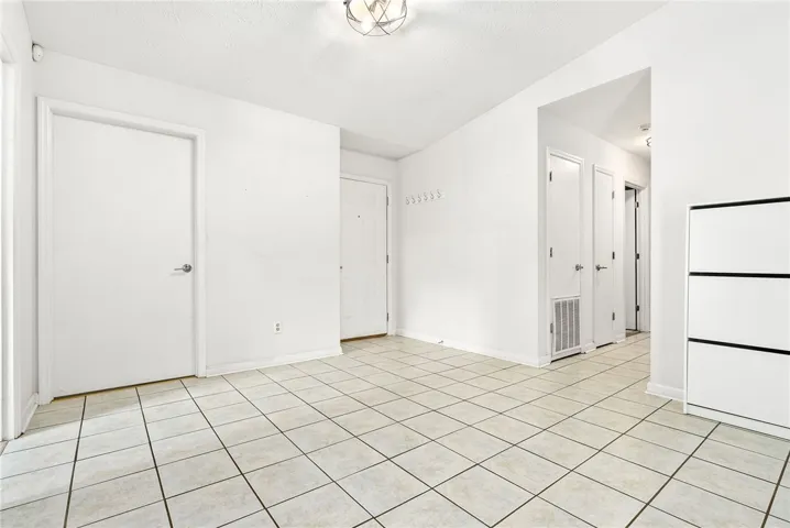 Looking at front door and hallway