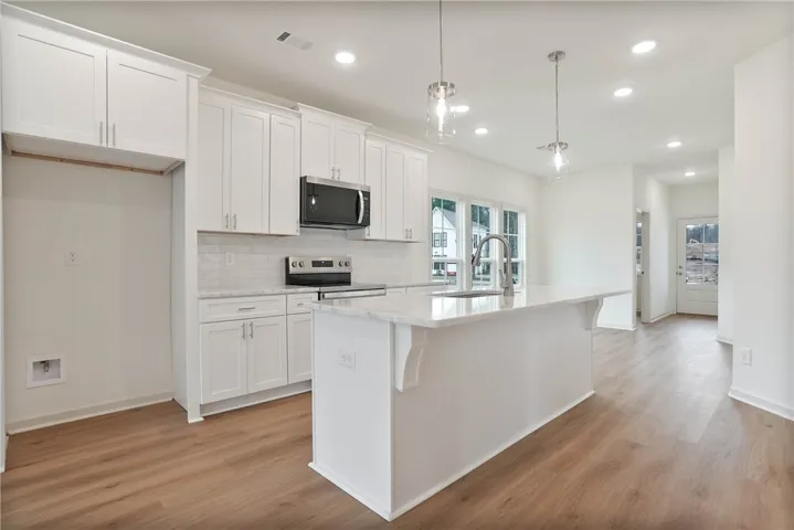EXAMPLE PHOTOS of completed Hayden Floor plan