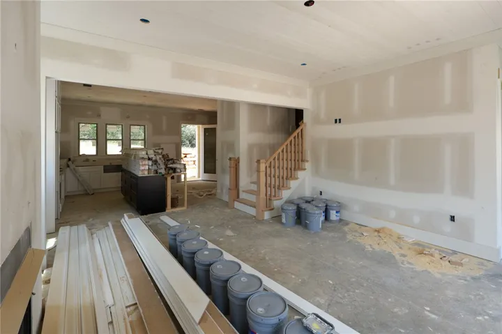 This interior image showcases a home under construction, offering a glimpse into its future potential.