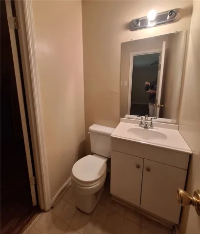 This clean and functional bathroom offers essential amenities for everyday convenience.