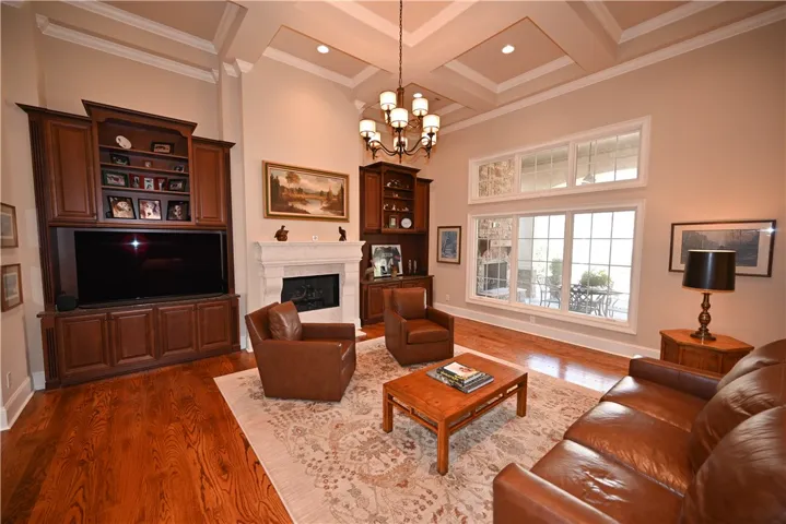 Grand living room with high coffered ceilings.