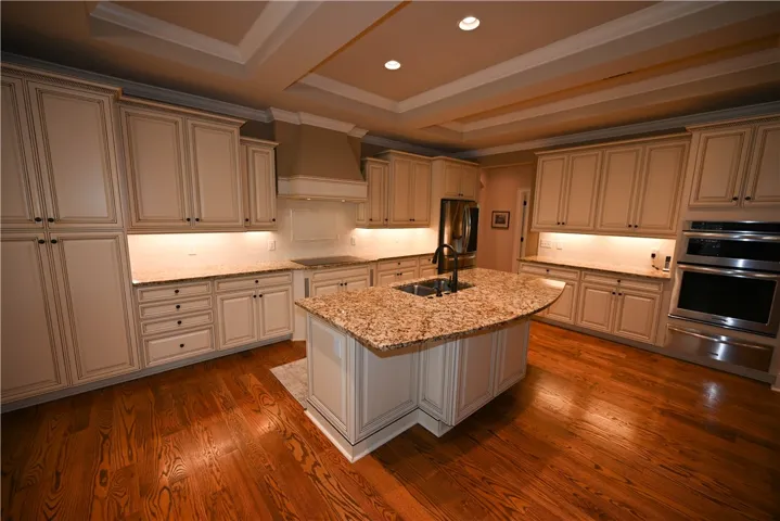 Coffered ceiling extends to the kitchen.