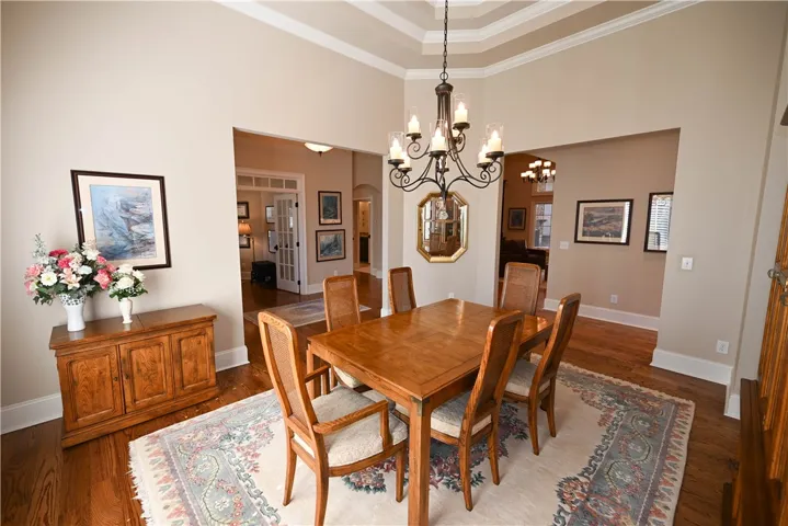 Dining room opens up to living spaces.