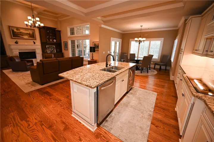 Stainless steel appliances, a beverage fridge, and true butler's pantry.