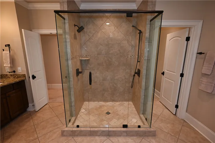 Oversized tile/glass shower.