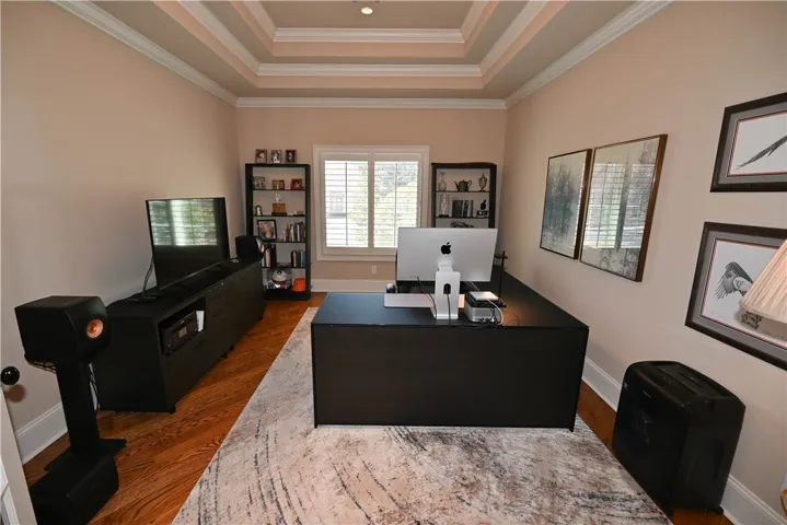 Home office/study. Could also be a 5th bedroom.